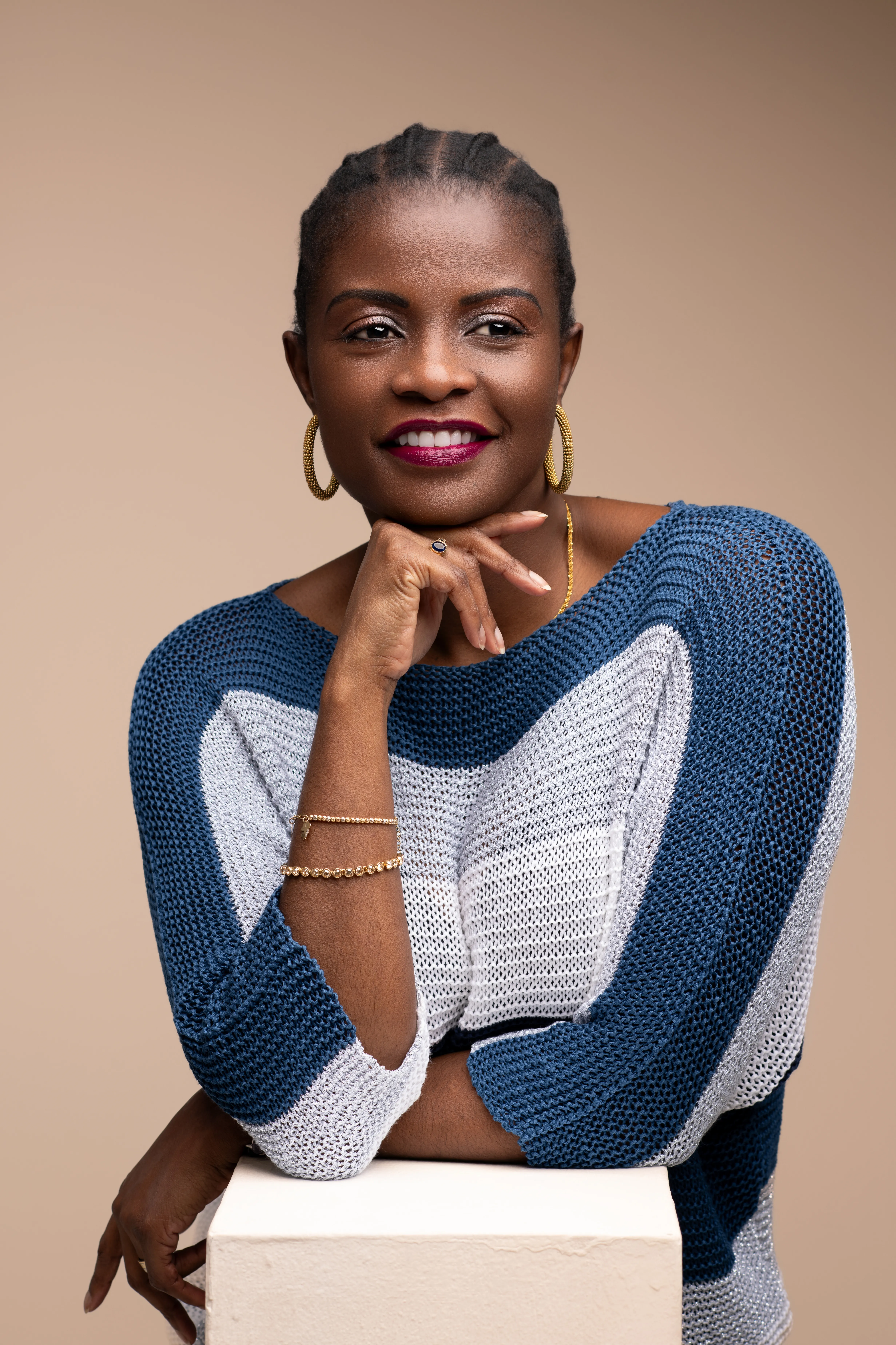 Jónia Presado corporate shoot — blue sweater